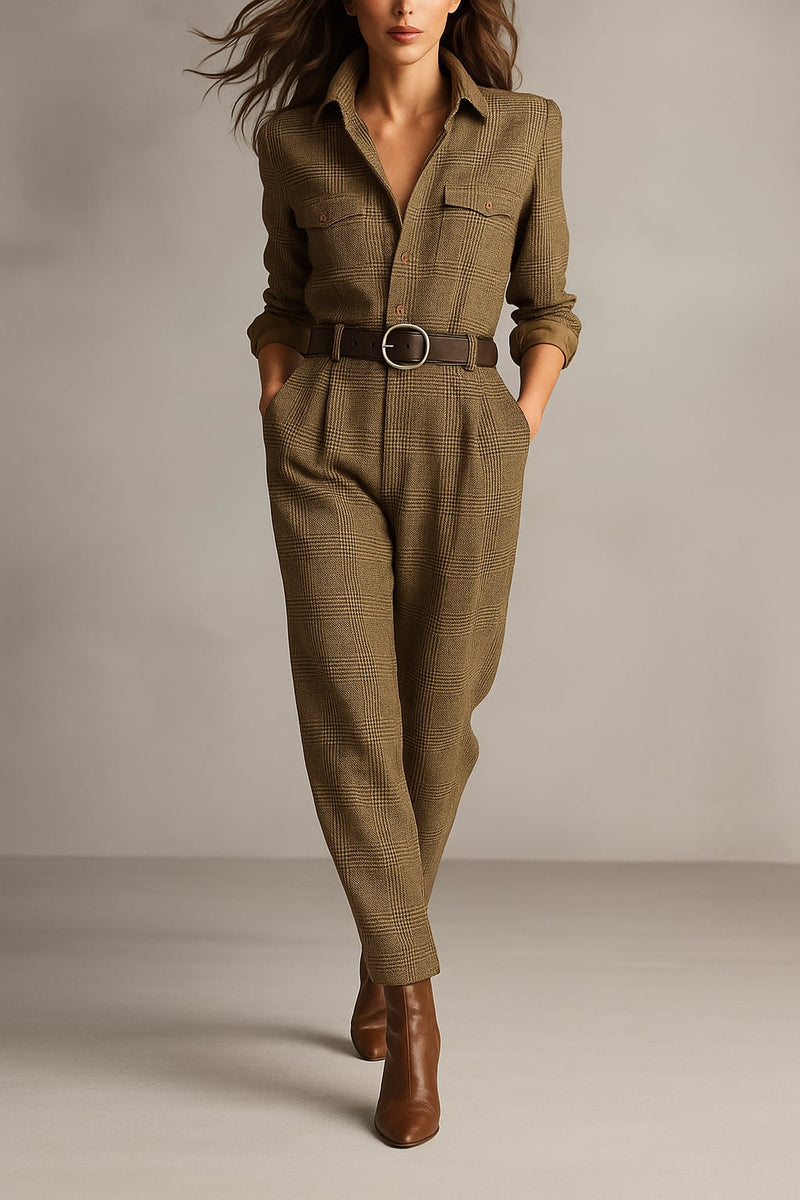 Woman wearing a brown plaid tailored jumpsuit with a sleek, elongated silhouette, styled for an elegant everyday look