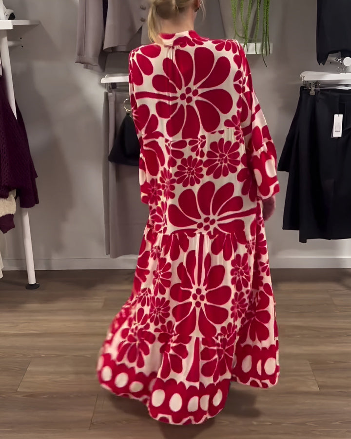 Side view of woman in red printed maxi dress showing fluid silhouette and elongating hem length