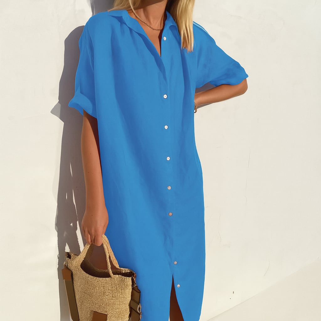 Close-up detail of the button down front and collared neckline on the Estelle shirt dress