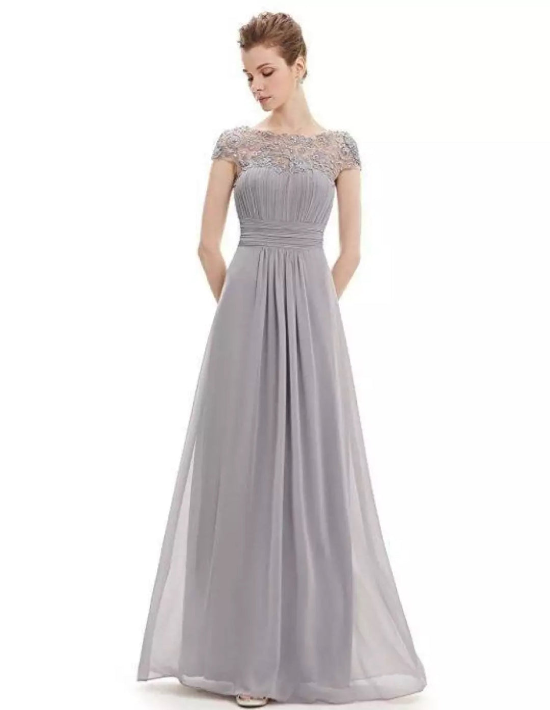 Model posing in the navy blue lace A-line dress, ideal for weddings and formal events