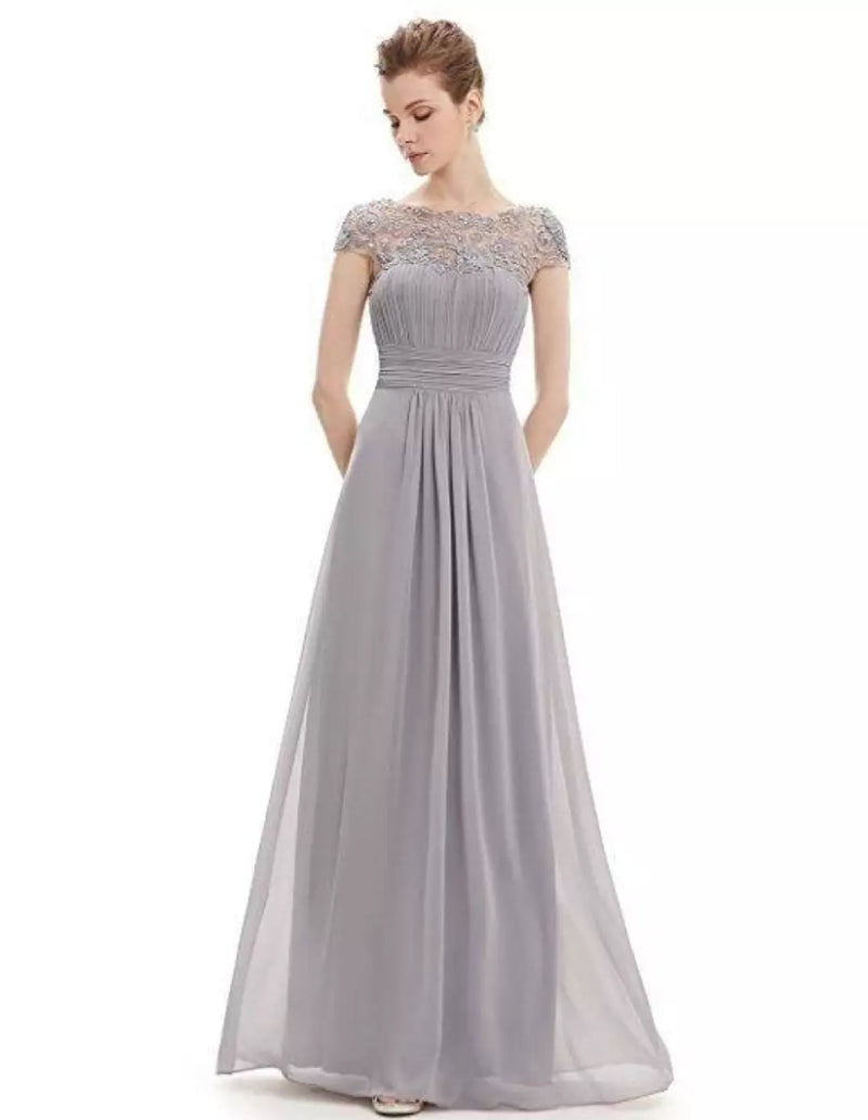 Model posing in the navy blue lace A-line dress, ideal for weddings and formal events