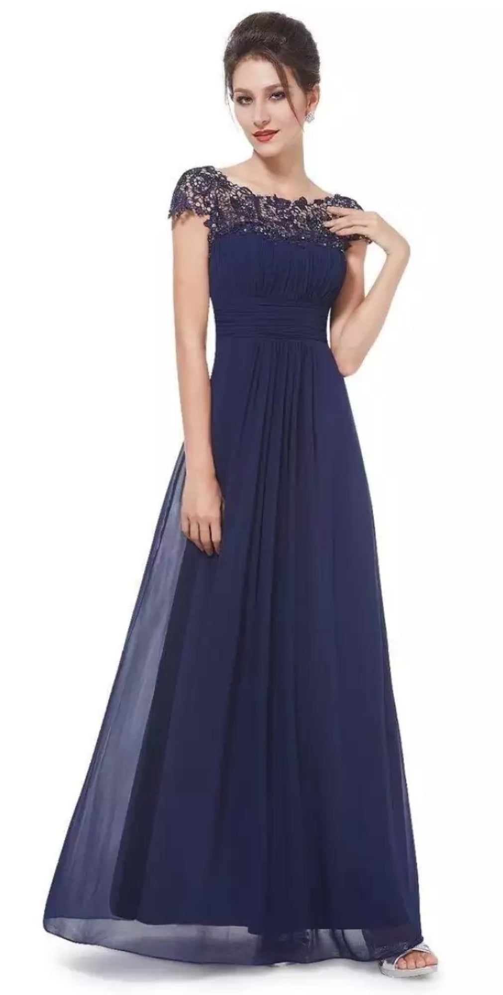 Side profile of the elegant A-line dress highlighting the smooth flowing skirt and lace detailing