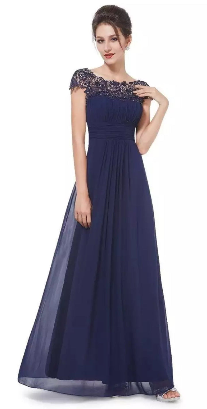 Side profile of the elegant A-line dress highlighting the smooth flowing skirt and lace detailing