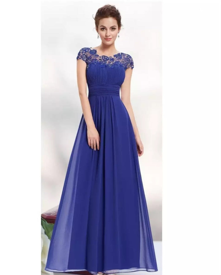 Flat lay of the lace occasion dress showing fabric texture, collar detail, and sheer mesh splicing