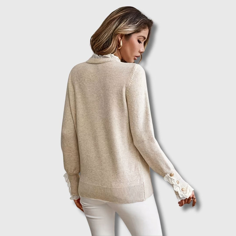 Close-up detail of delicate lace trim on an apricot long sleeve sweater from Florimay