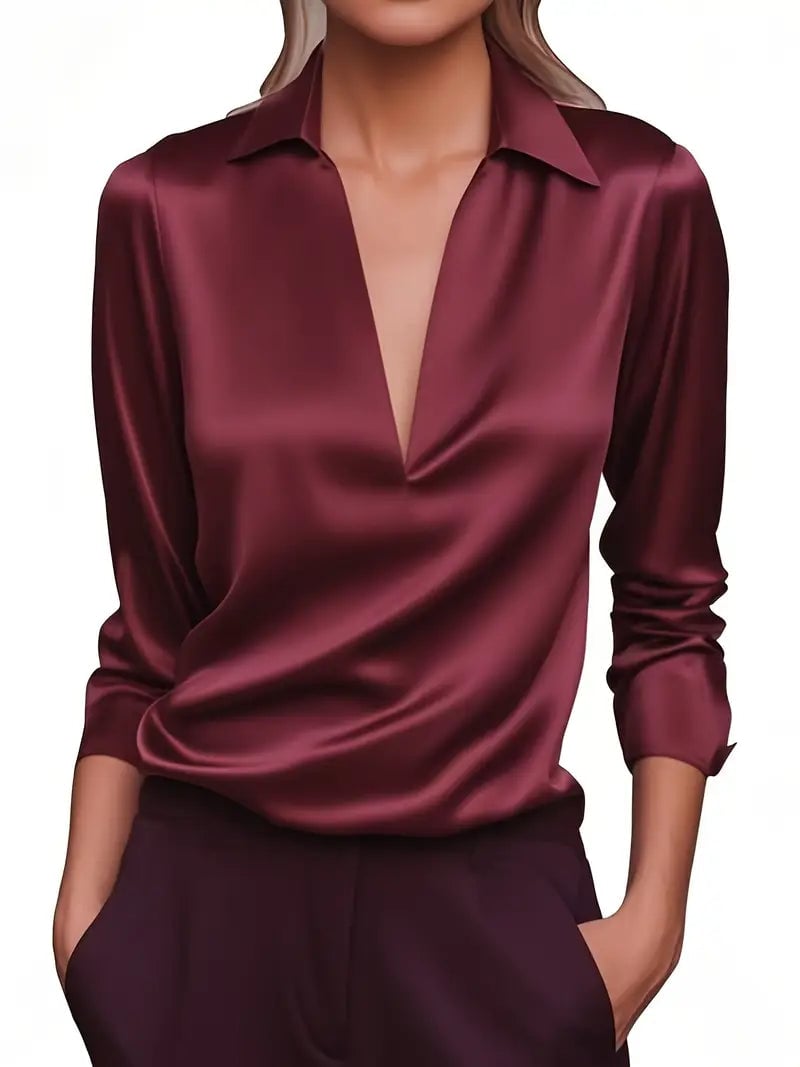 Orange satin blouse side profile showing graceful drape over curves