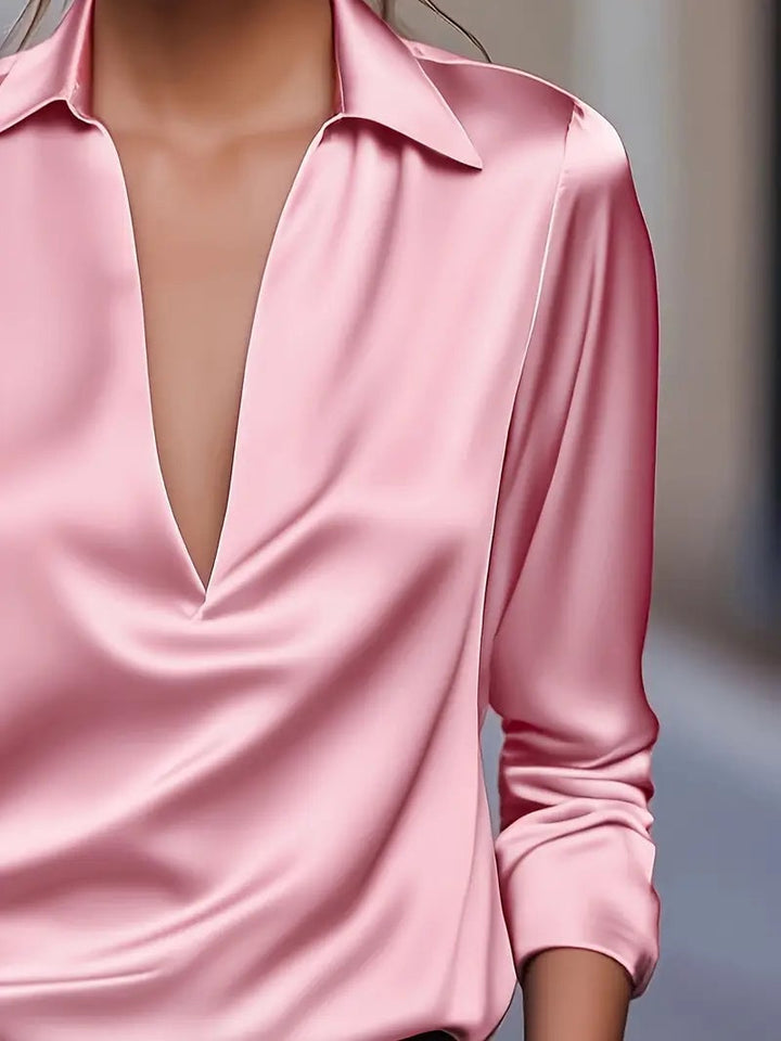 Brown V-neck satin blouse styled with trousers — full-length view