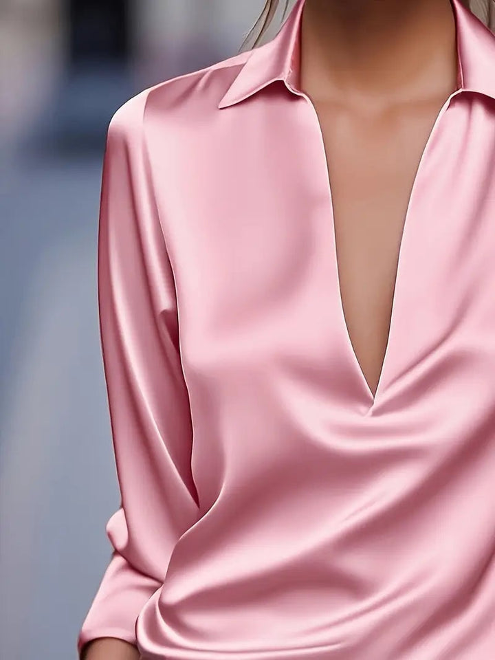 Purple satin blouse close-up of neckline and fabric detail