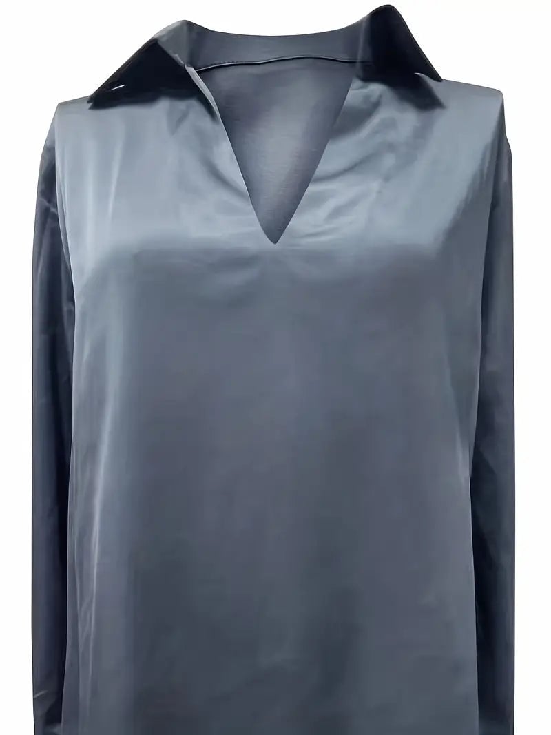 Brown satin blouse shoulder and sleeve detail close-up