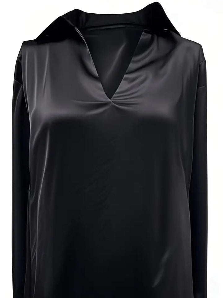 White satin blouse side drape detail close-up