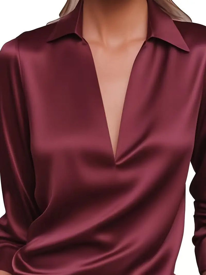 White satin blouse flat lay with size reference