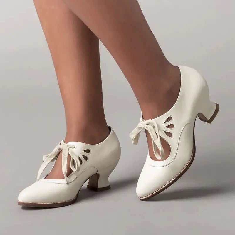 Evangeline women's flat cushioned sandals in white, front view