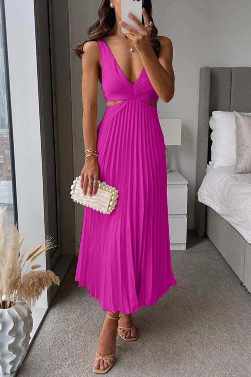 Woman in the Evangeline maxi dress styled with strappy sandals for a garden party look