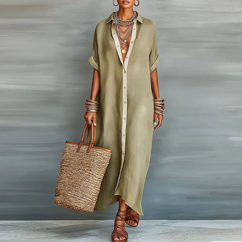 Woman wearing the Evelina khaki button down maxi shirt dress with short sleeves and collared neckline
