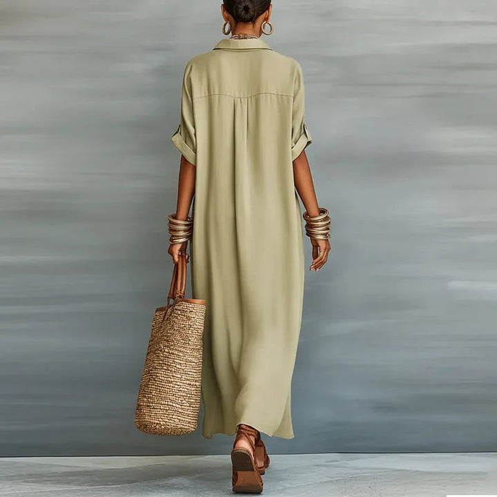 Front view of the Evelina maxi shirt dress in black showing full floor-length silhouette and button front