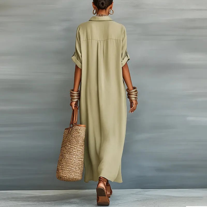 Front view of the Evelina maxi shirt dress in black showing full floor-length silhouette and button front