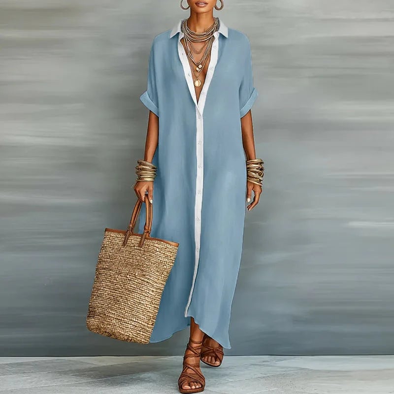 Lifestyle shot of the Evelina maxi shirt dress in khaki worn outdoors on a sunny day