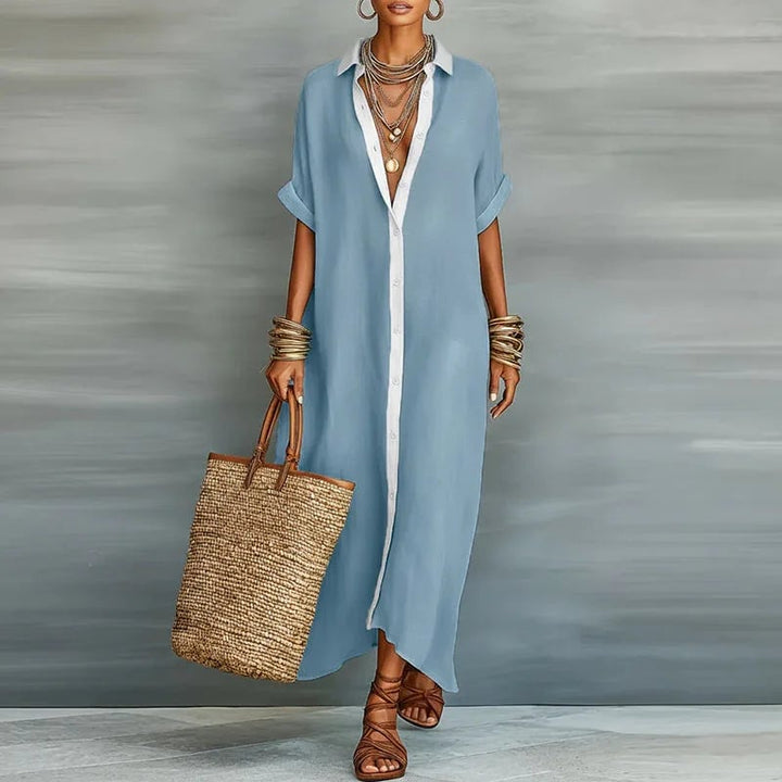 Lifestyle shot of the Evelina maxi shirt dress in khaki worn outdoors on a sunny day