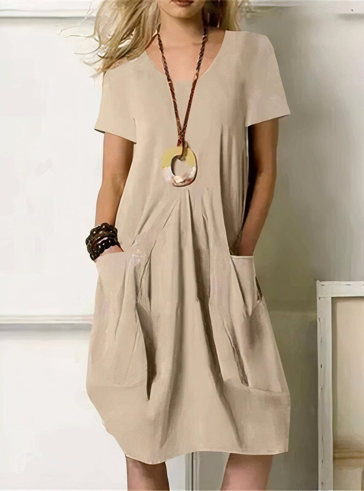 Front view of the Evelyn relaxed fit dress showing its flowing silhouette and soft fabric