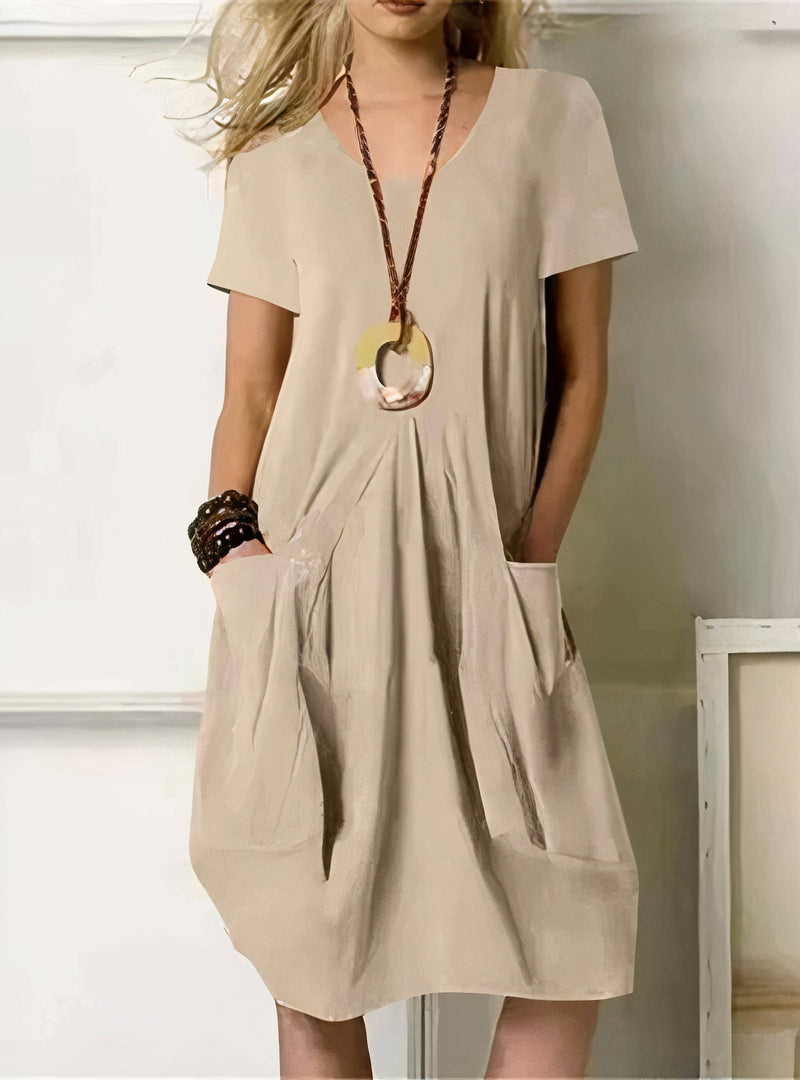 Front view of the Evelyn relaxed fit dress showing its flowing silhouette and soft fabric
