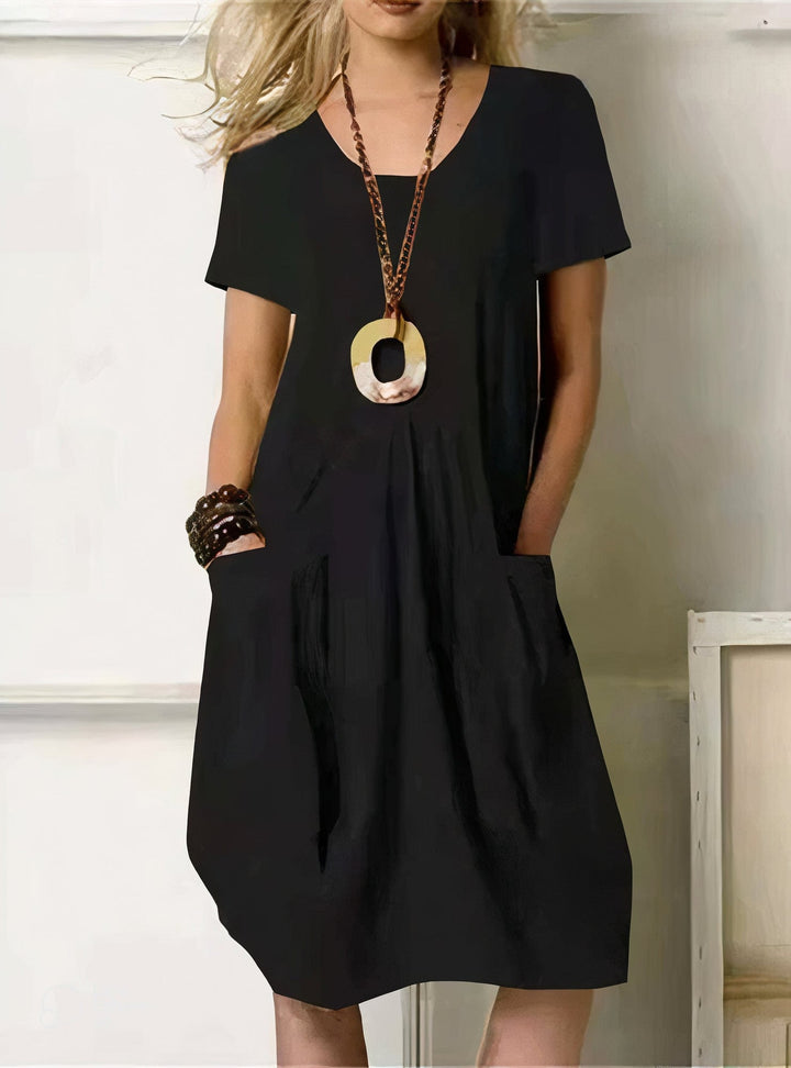 Close-up detail of the Evelyn dress side pocket and lightweight breathable material