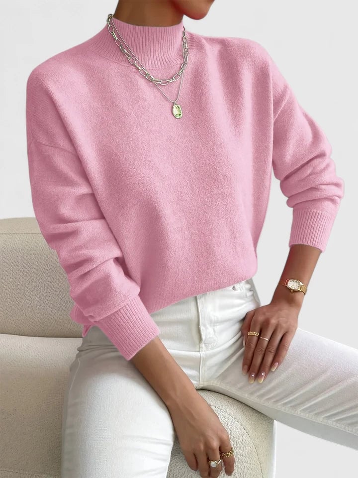 Close-up of the Evelyn turtleneck sweater showing soft fabric texture and refined neckline