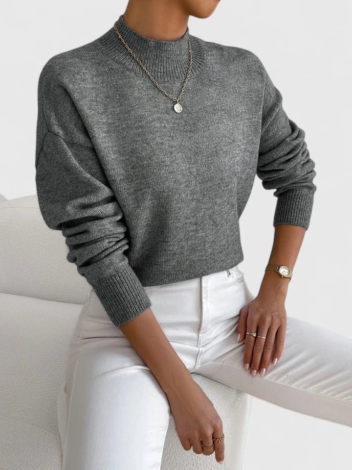 Detail shot of the Evelyn turtleneck sweater neckline in pink