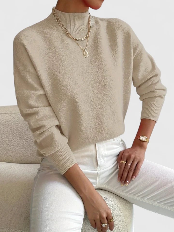 Evelyn turtleneck sweater in multiple color options displayed together — white, pink, beige, and black