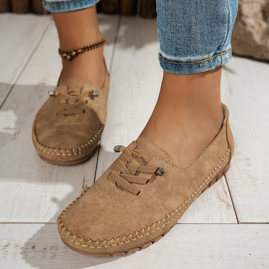 Evelyne women's lace-up comfort loafers in blue, side profile on white background