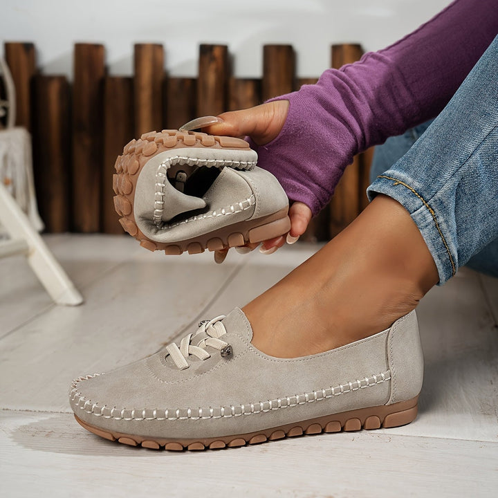 Evelyne loafers in gray from behind showing heel and fit