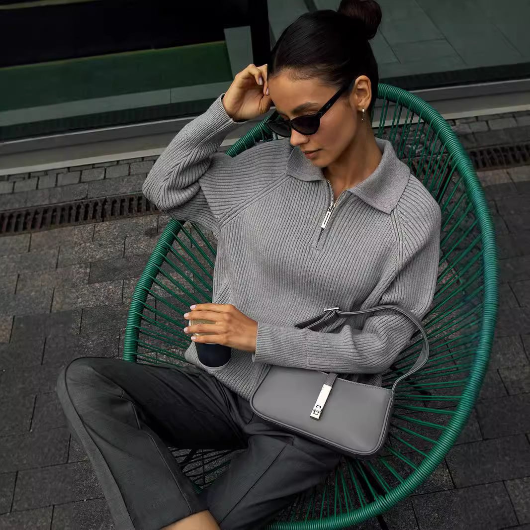 Detail shot of the neckline on the Everly sweater in beige