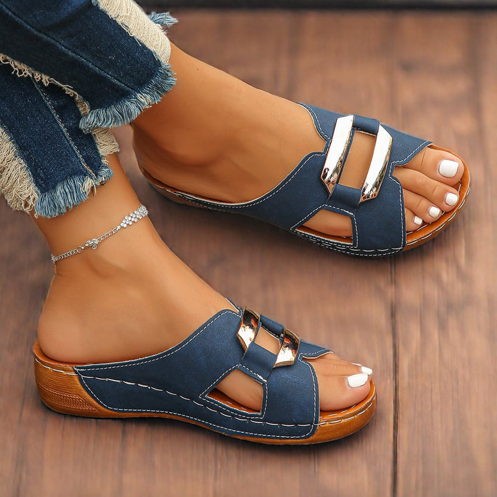 Everly cushioned adjustable buckle sandals in navy blue on a white background