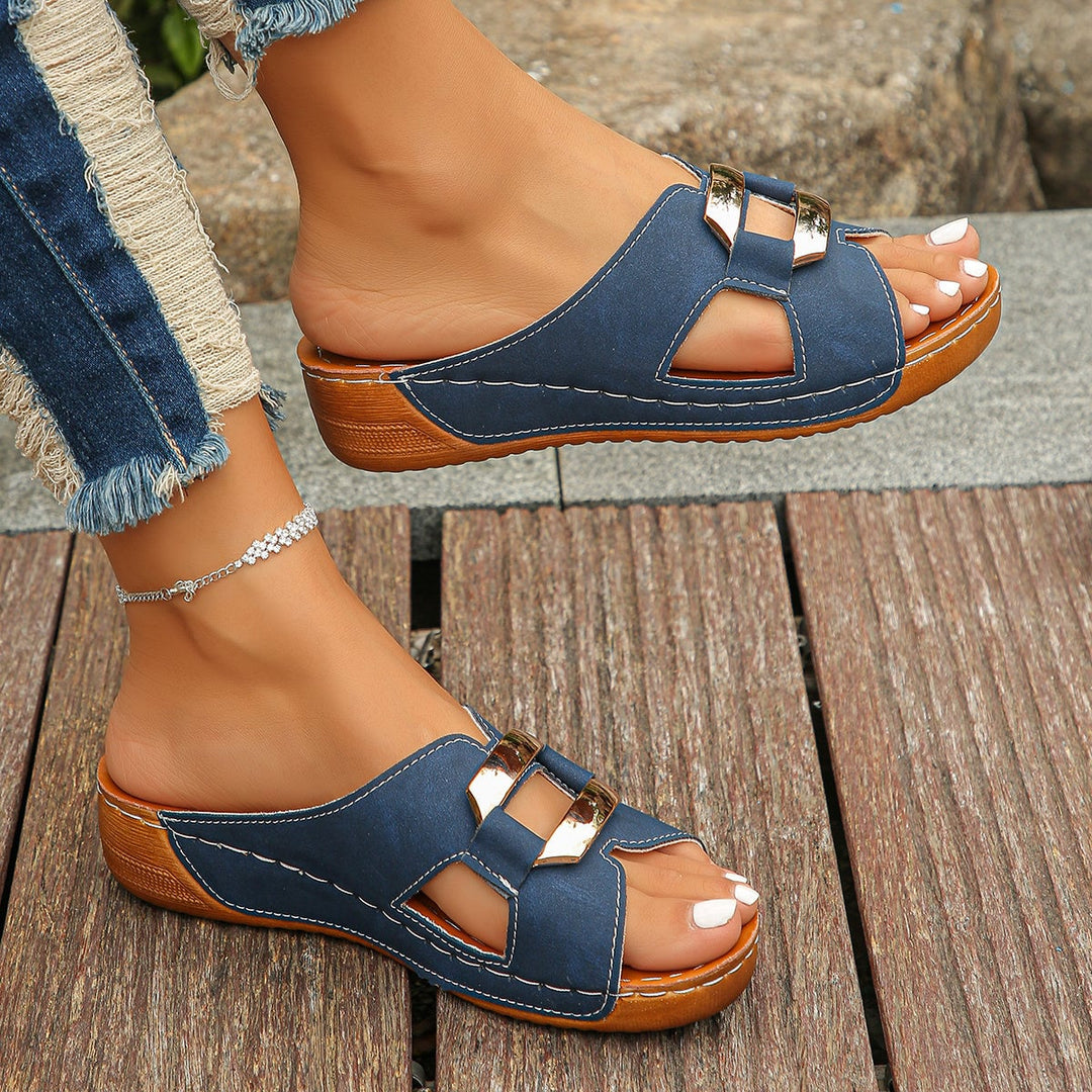 Close-up of adjustable buckle detail on Everly beige women's sandals