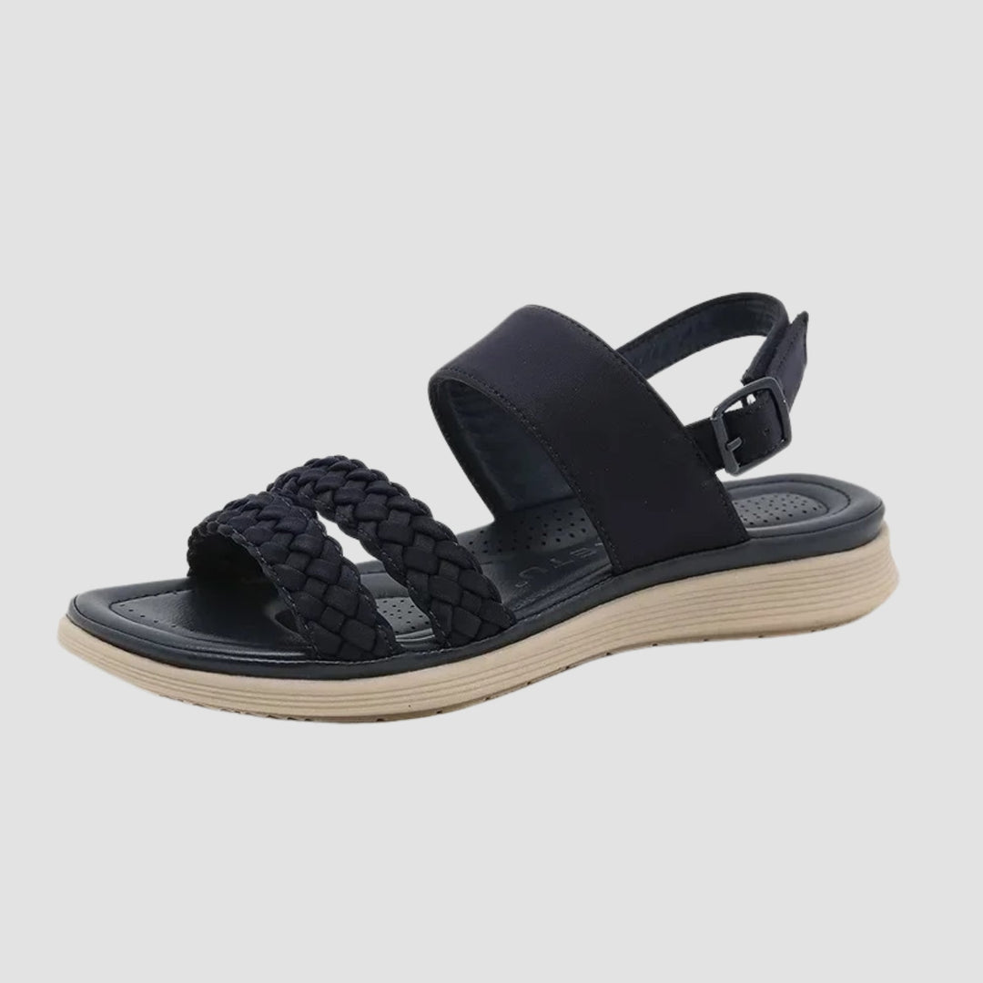 Everly vegan leather sandals in navy blue displayed on a clean white surface