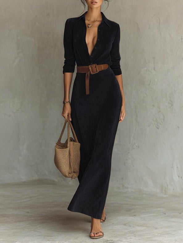 Close-up of the luxurious suede texture on a black maxi gown showing rich fabric detail