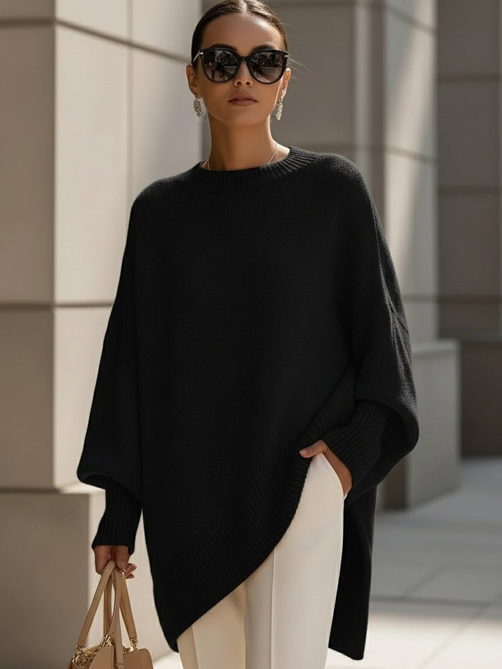 Close-up of the Faith elegant sweater showing soft fabric texture and clean lines in olive green