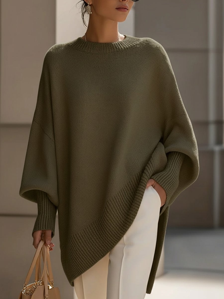 Front view of the Faith elegant sweater in black, draped smoothly for a flattering silhouette