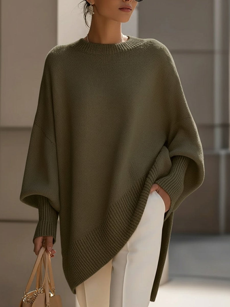 Front view of the Faith elegant sweater in black, draped smoothly for a flattering silhouette