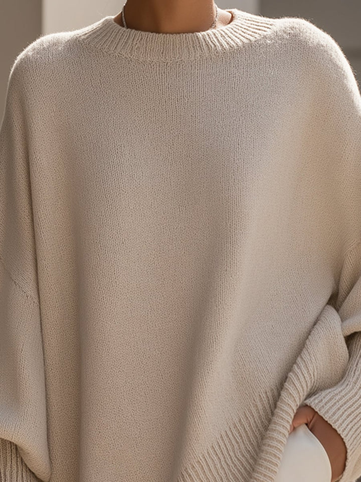Detail shot of the Faith elegant sweater neckline and subtle detailing in black