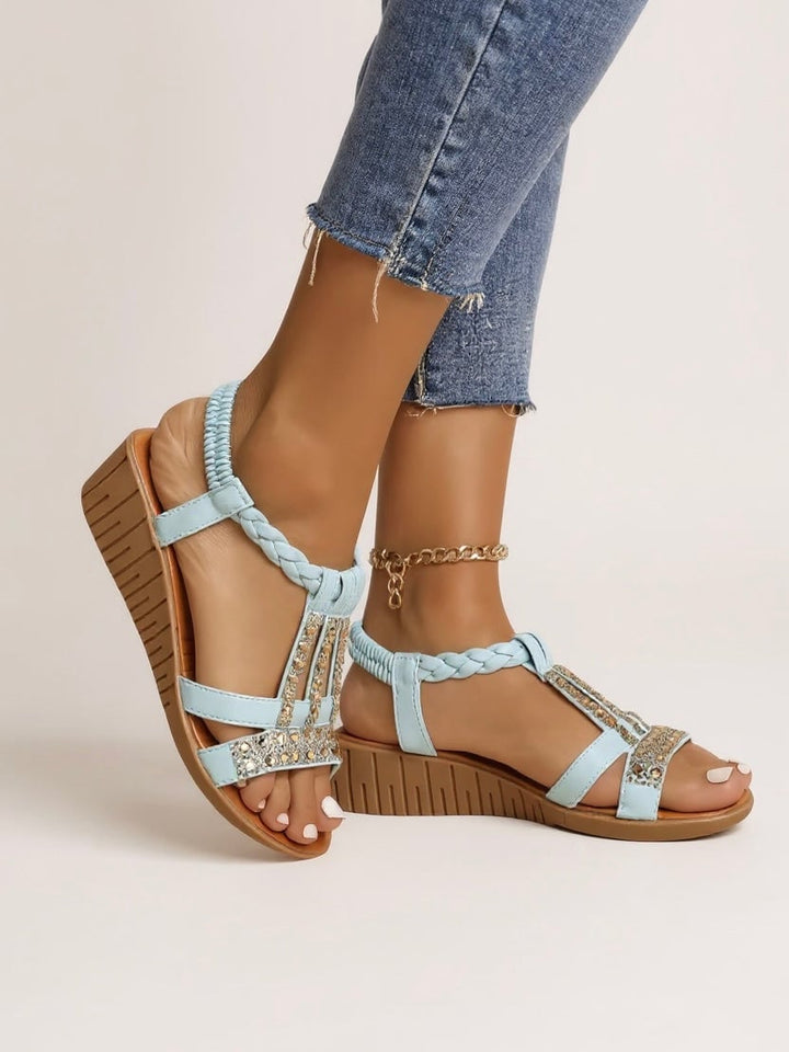 Faith wedge sandals in beige showing embellishment detail and stable wedge heel, side view