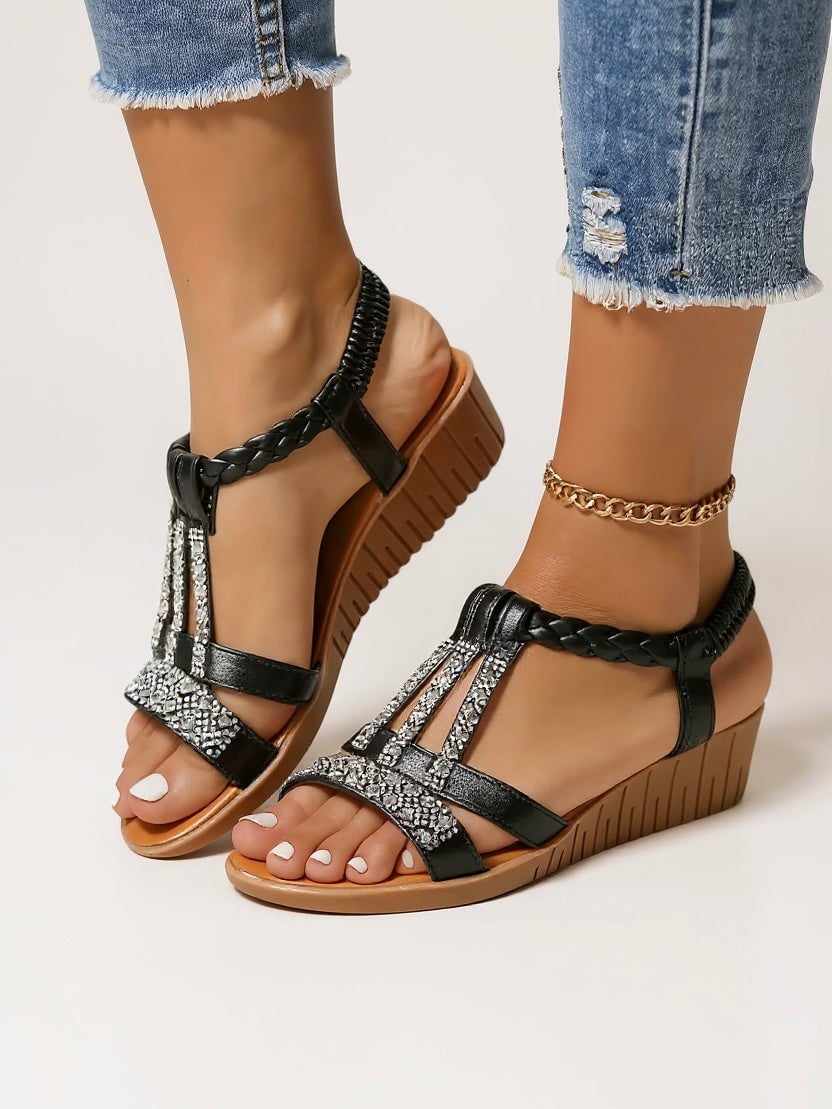 Faith wedge sandals in tangerine displayed on a neutral background, top-down view