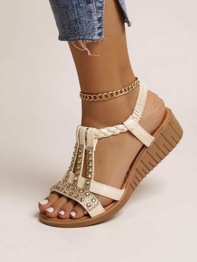 Flat lay of Faith wedge sandals in green and silver colorways side by side
