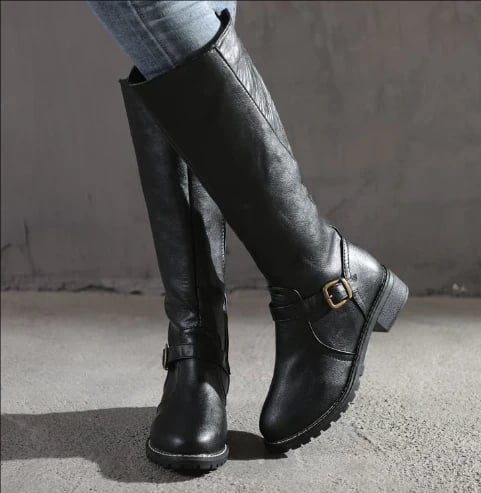 Women's knee-high boots in black with a sleek contoured silhouette, front view