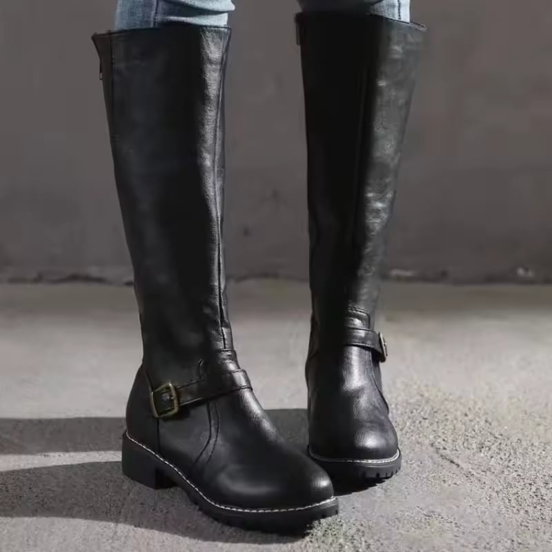 Dark brown Fara boots shown from the back displaying the smooth shaft and heel detail