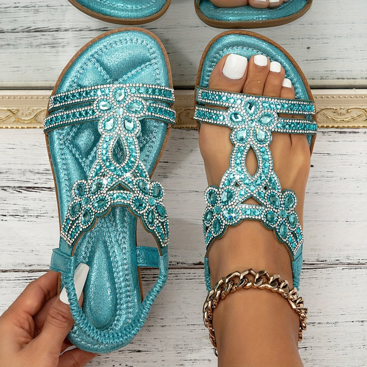 Close-up of intricate boho embellishment detail on Farrah sandals in sky blue