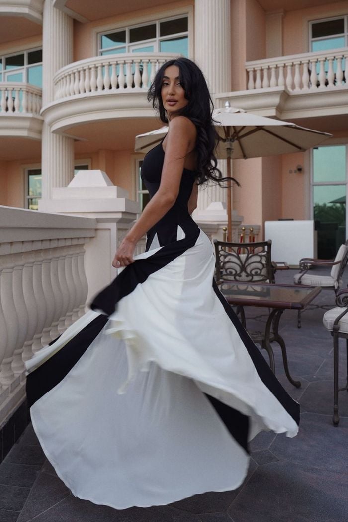 Full-length front view of the Faye maxi dress showing graceful movement