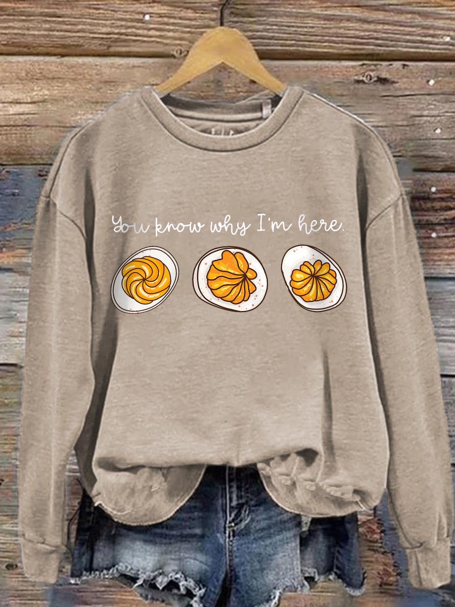 Lifestyle shot of the Feast Mode sweatshirt styled for a casual Thanksgiving gathering