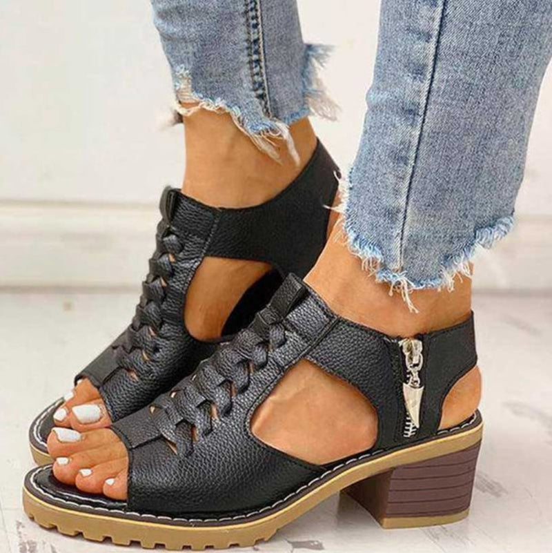 Felicity high heel sandals in black showing adjustable strap detail and supportive heel, front view