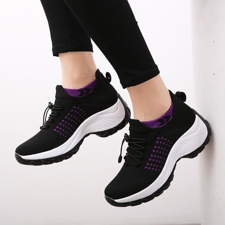 Flat lay of Felicity orthopedic shoes in Gray Pink and Black White colorways
