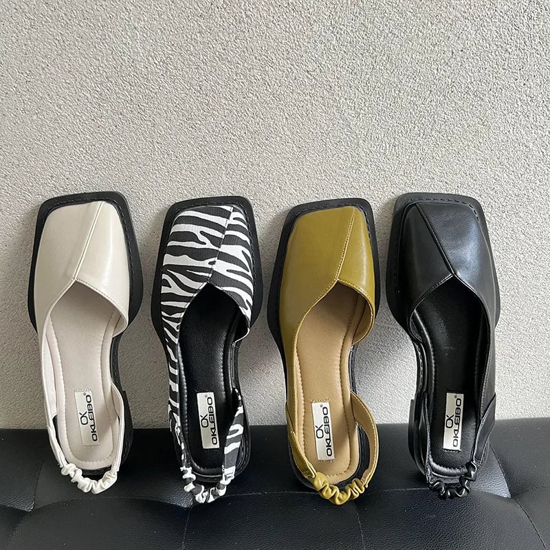 Felicity slip-on shoes in zebra print, top-down view showing memory foam insole